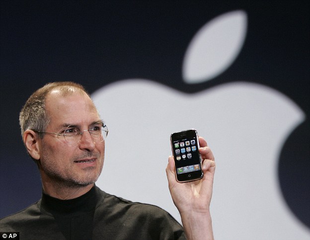 steve jobs holding iphone